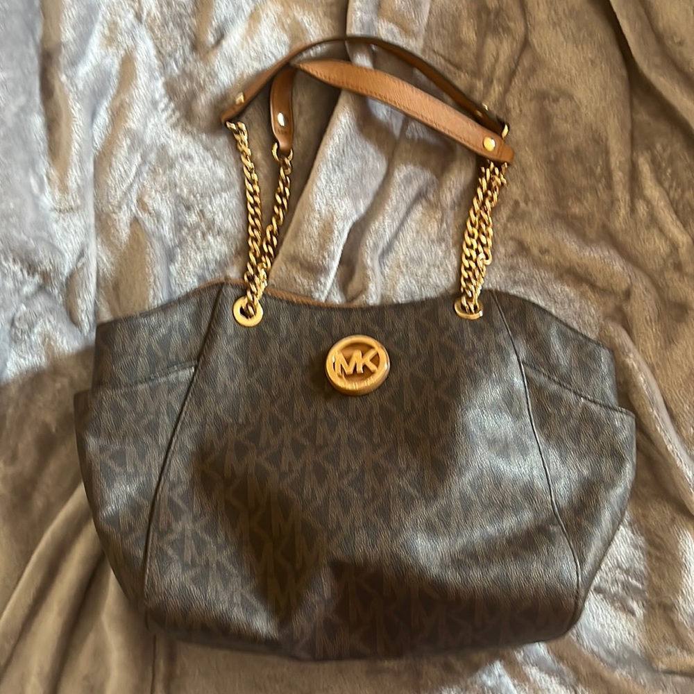 no tags -used yet brand new condition, like new! MK bag with gold